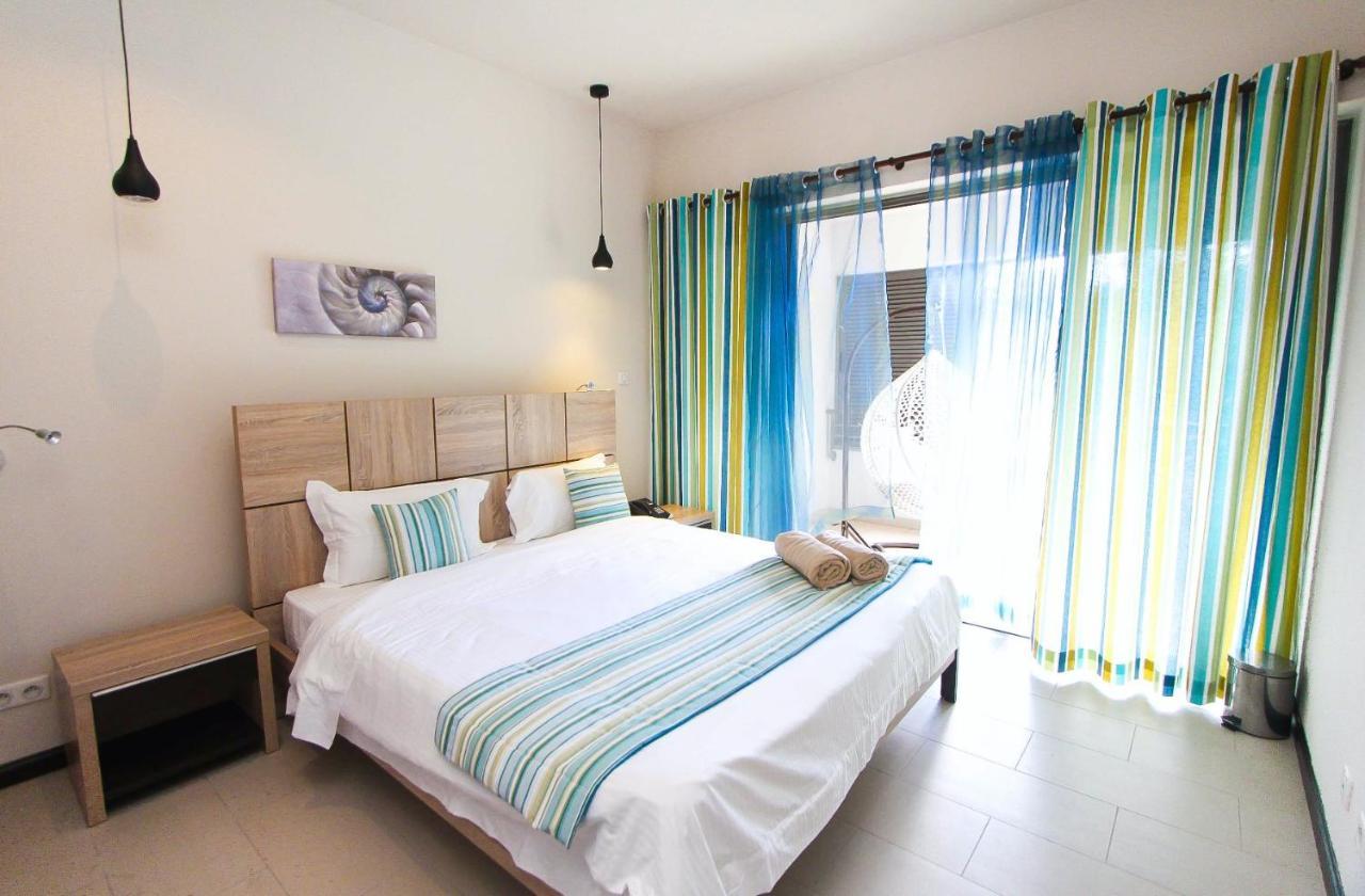 Nitzana Residences & Restaurant Pereybere Beach Buitenkant foto
