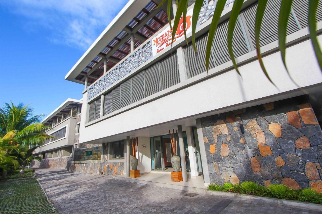 Nitzana Residences & Restaurant Pereybere Beach Buitenkant foto