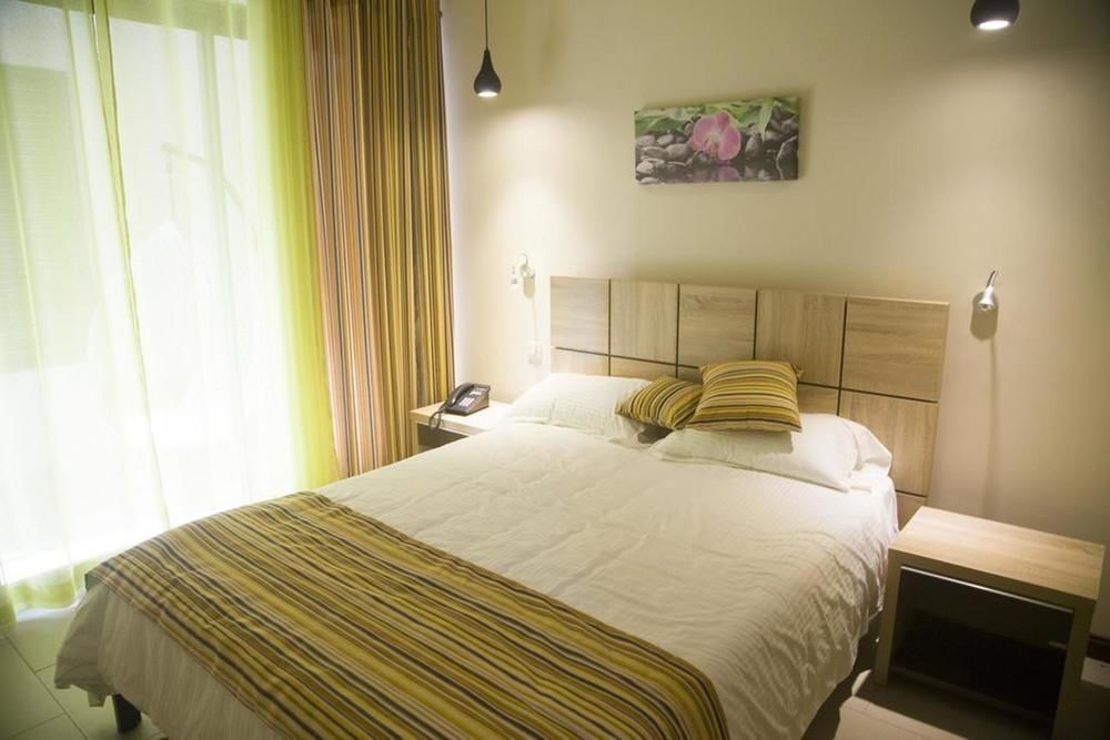 Nitzana Residences & Restaurant Pereybere Beach Buitenkant foto